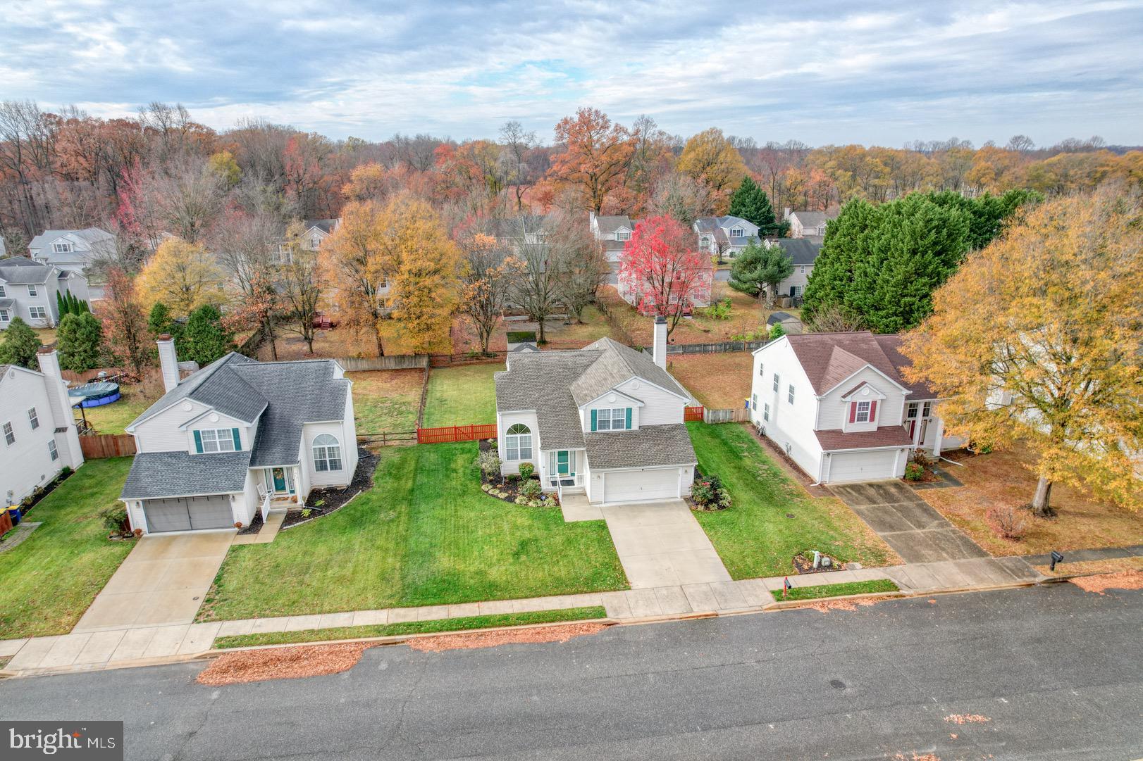 22 Arbor Drive Dover, DE 19904 - Photo 3 of 52 an aerial view of a house with garden space and street view