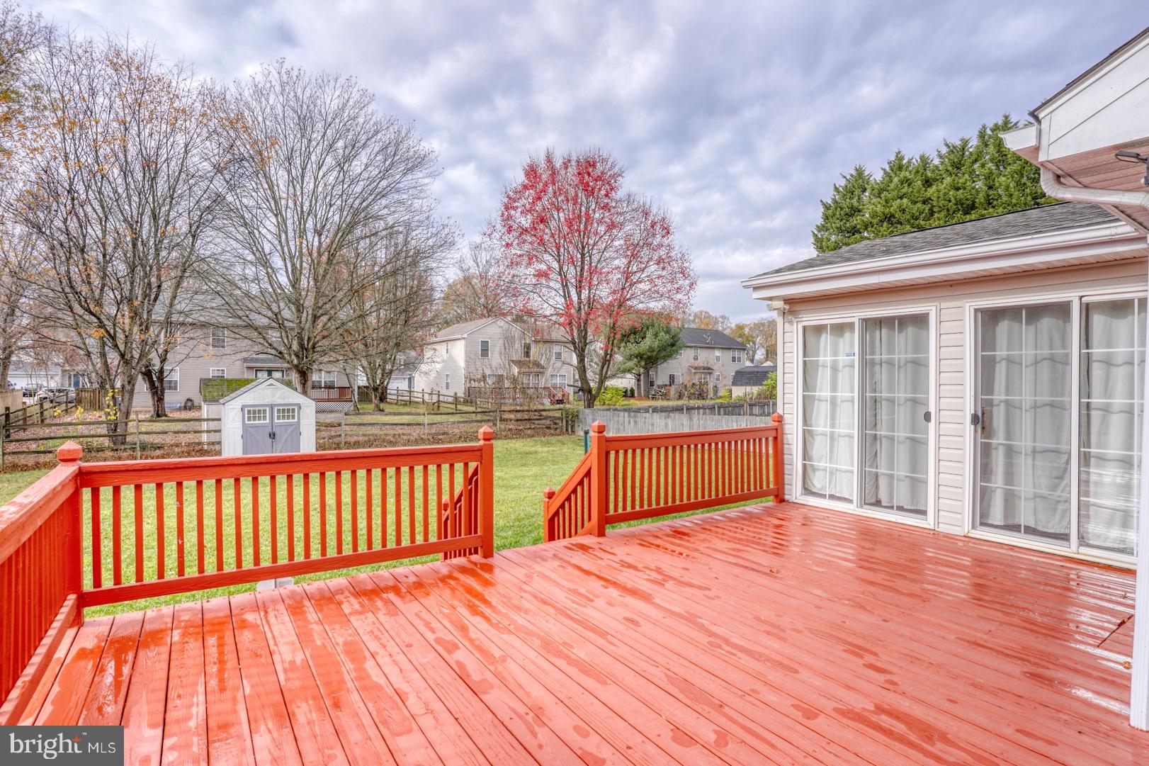 22 Arbor Drive Dover, DE 19904 - Photo 52 of 52 a balcony with wooden floor and trees