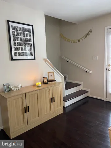 a hallway with cabinets
