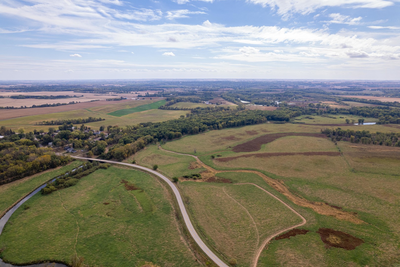 3537-3577 North Iris Hill Road Freeport, IL 61032 - Photo 15 of 60 an aerial view of residential houses with outdoor space and river