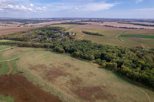 a aerial view of a house with a yard