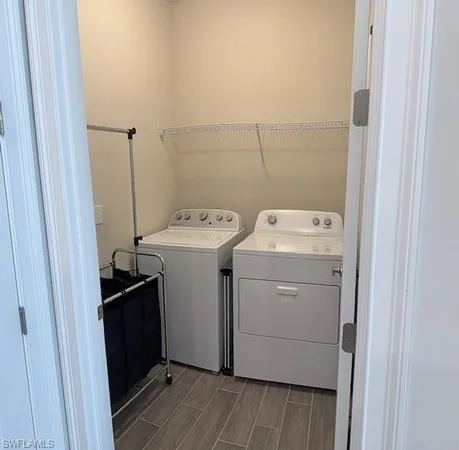 a utility room with dryer and washer