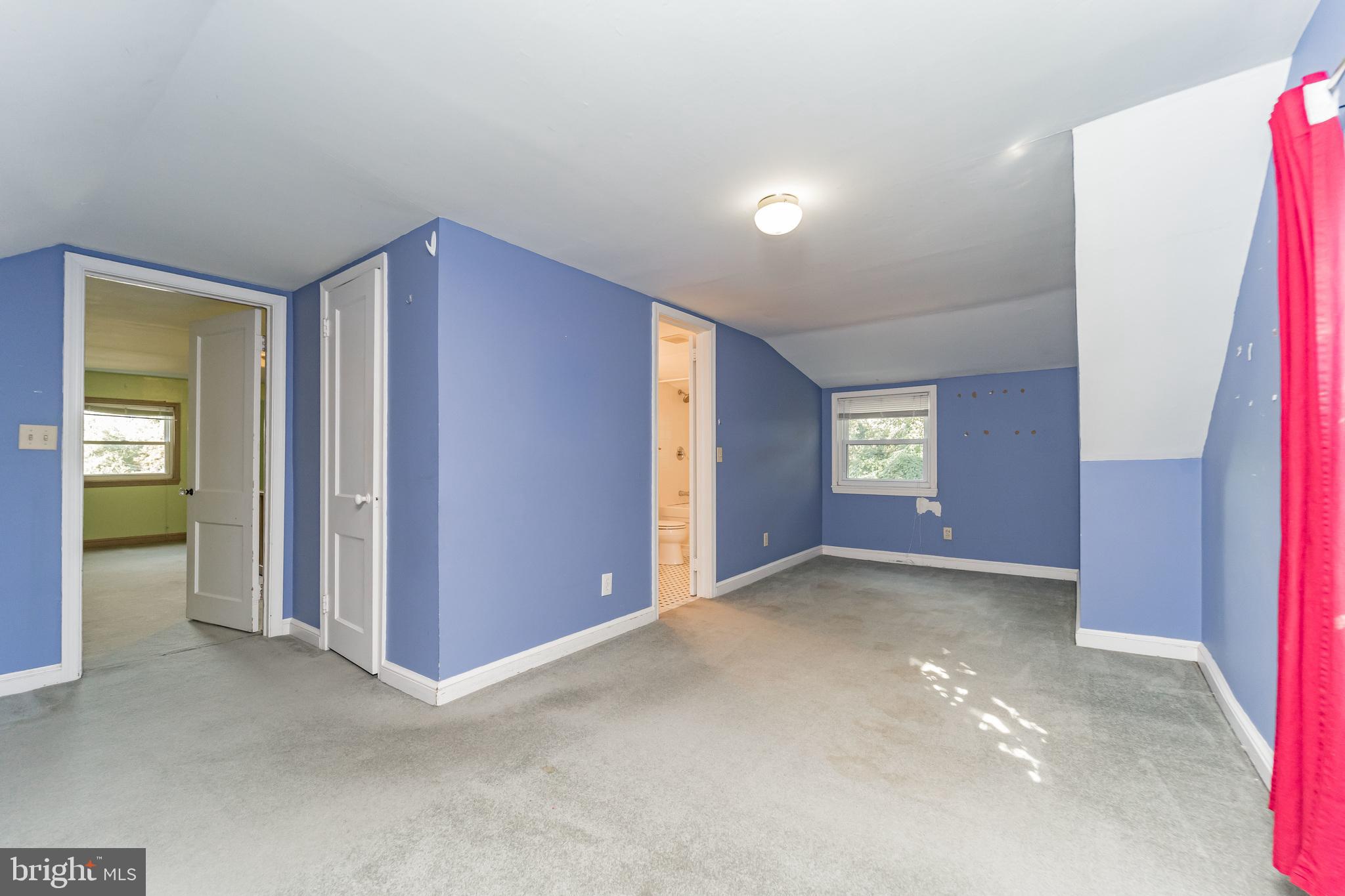 403 Belton Road Silver Spring, MD 20901 - Photo 15 of 22 an empty room with windows and closet