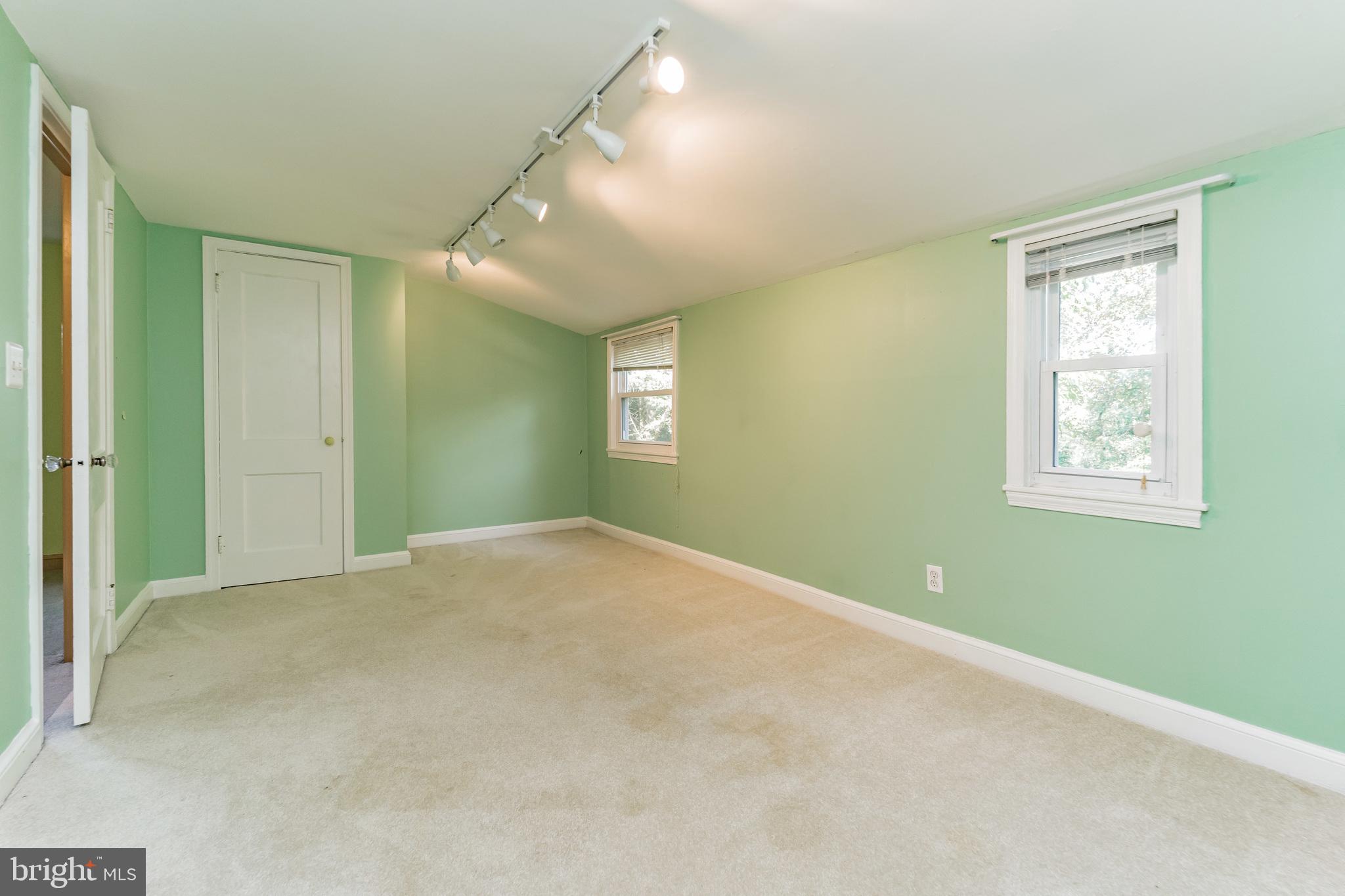 403 Belton Road Silver Spring, MD 20901 - Photo 18 of 22 a view of empty room with windows