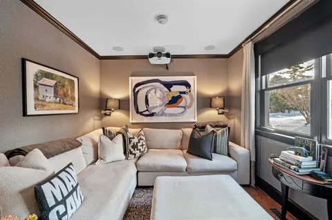 a view of a hallway with windows