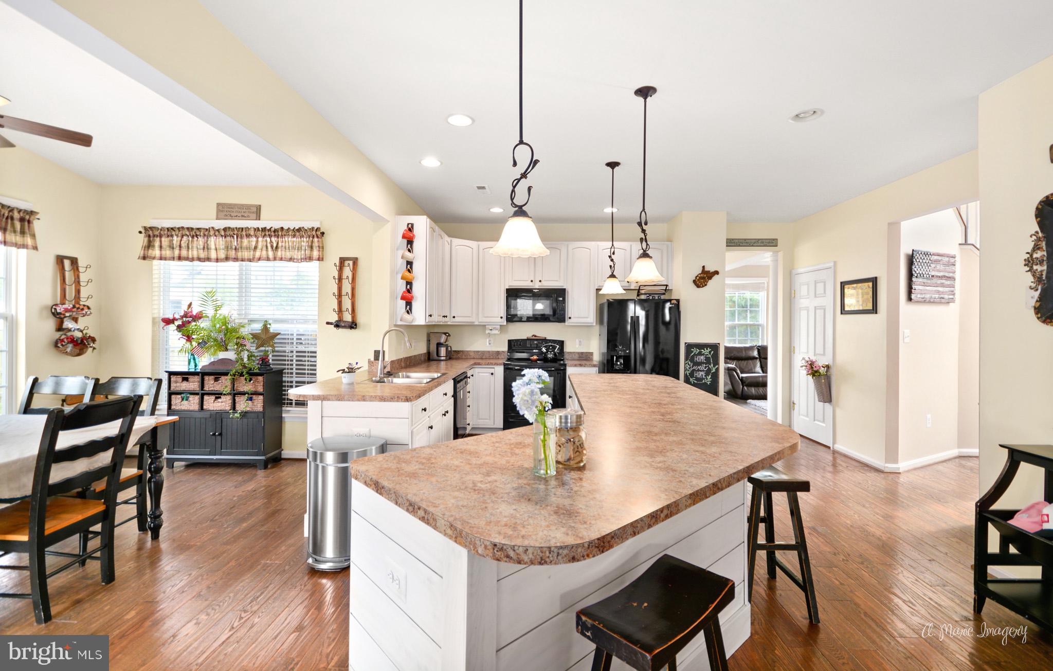 3904 Calico Circle Point of Rocks, MD 21777 - Photo 15 of 52 a view of kitchen and dining area with furniture