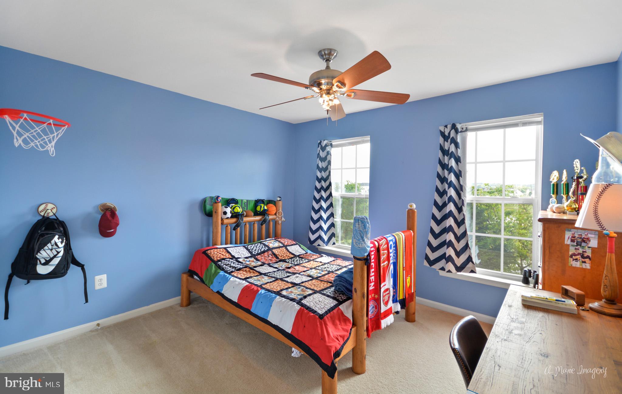3904 Calico Circle Point of Rocks, MD 21777 - Photo 35 of 52 a bedroom with a bed and a window