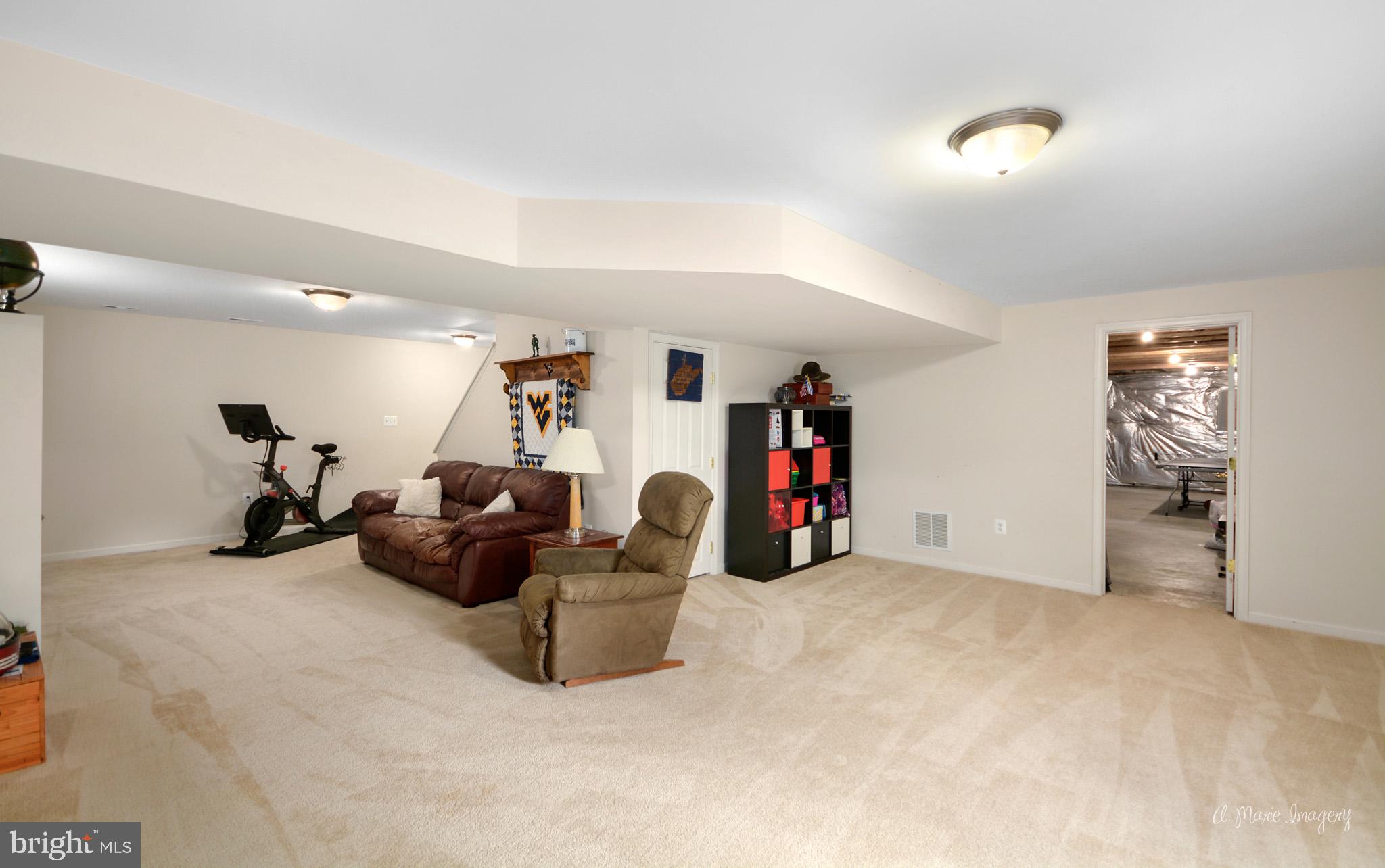 3904 Calico Circle Point of Rocks, MD 21777 - Photo 40 of 52 wooden floor and a ceiling fan in a room
