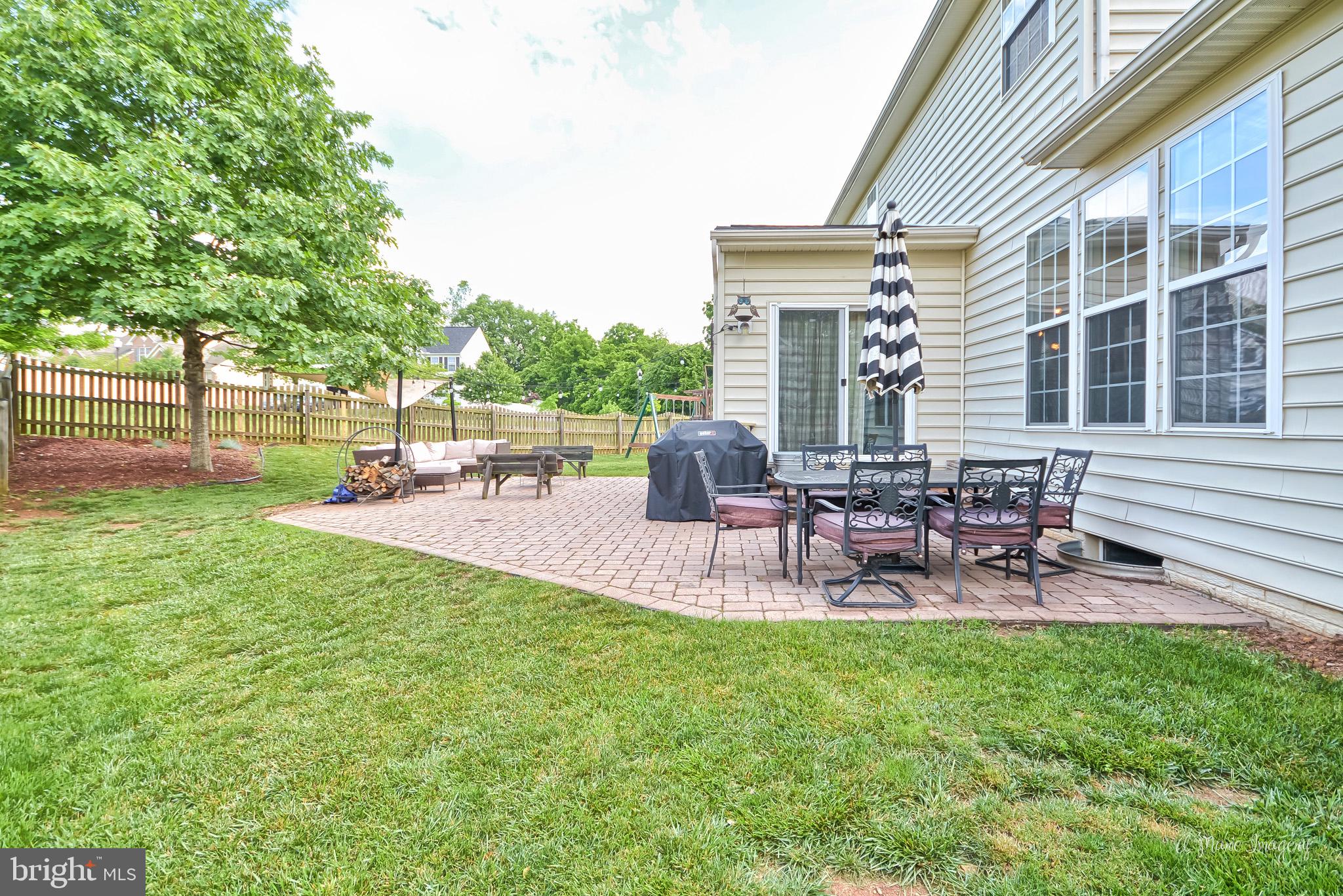 3904 Calico Circle Point of Rocks, MD 21777 - Photo 44 of 52 a view of a backyard with table and chairs with a patio