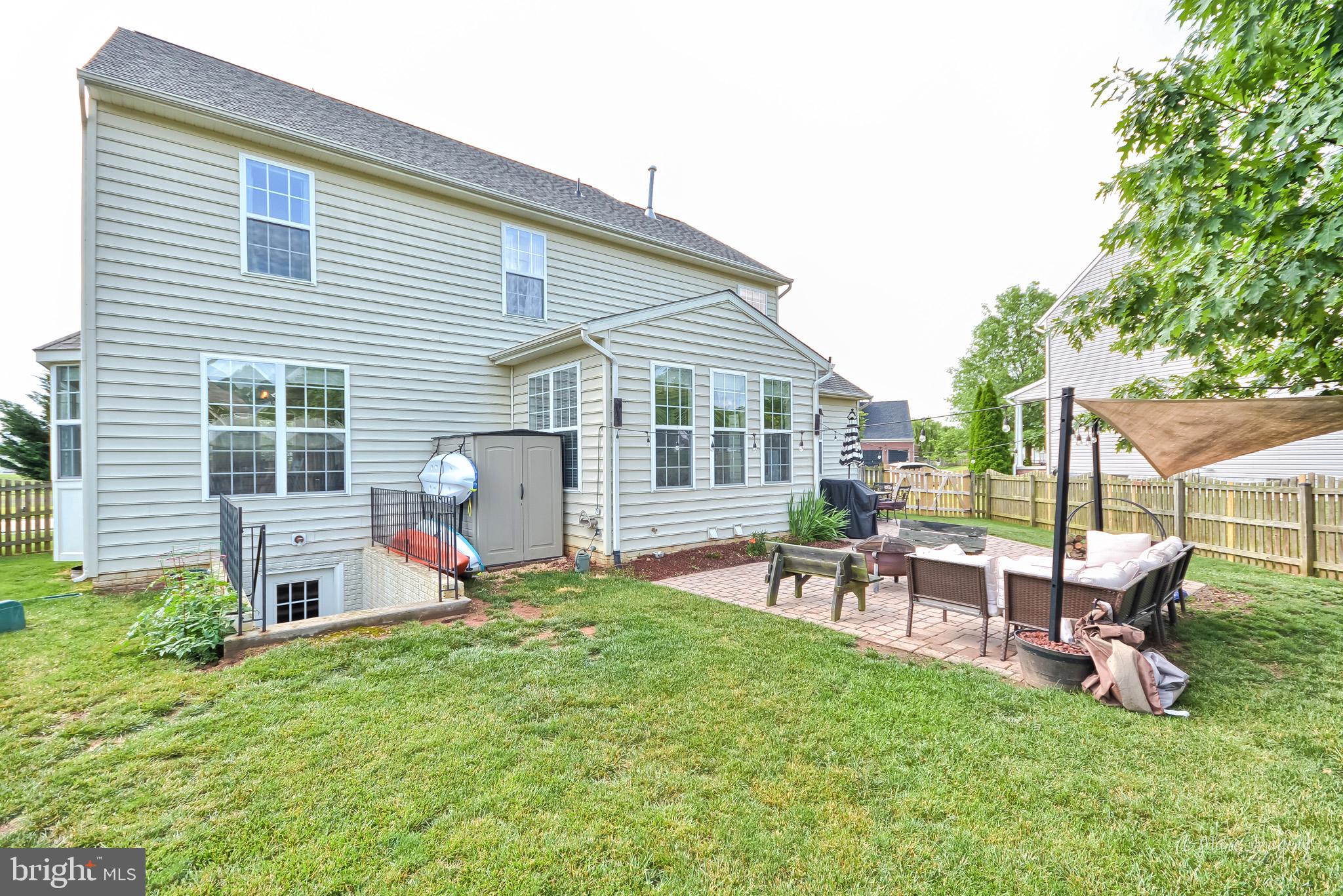 3904 Calico Circle Point of Rocks, MD 21777 - Photo 45 of 52 a view of a house with backyard sitting area and garden