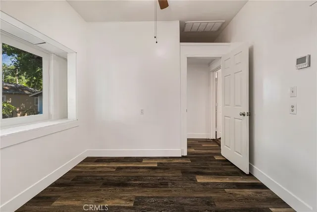 a view of small space with wooden floor