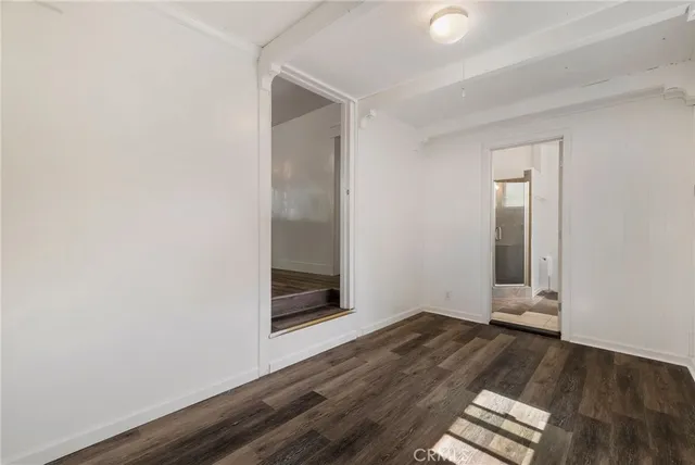 a kitchen that has a sink cabinets counter space and stainless steel appliances