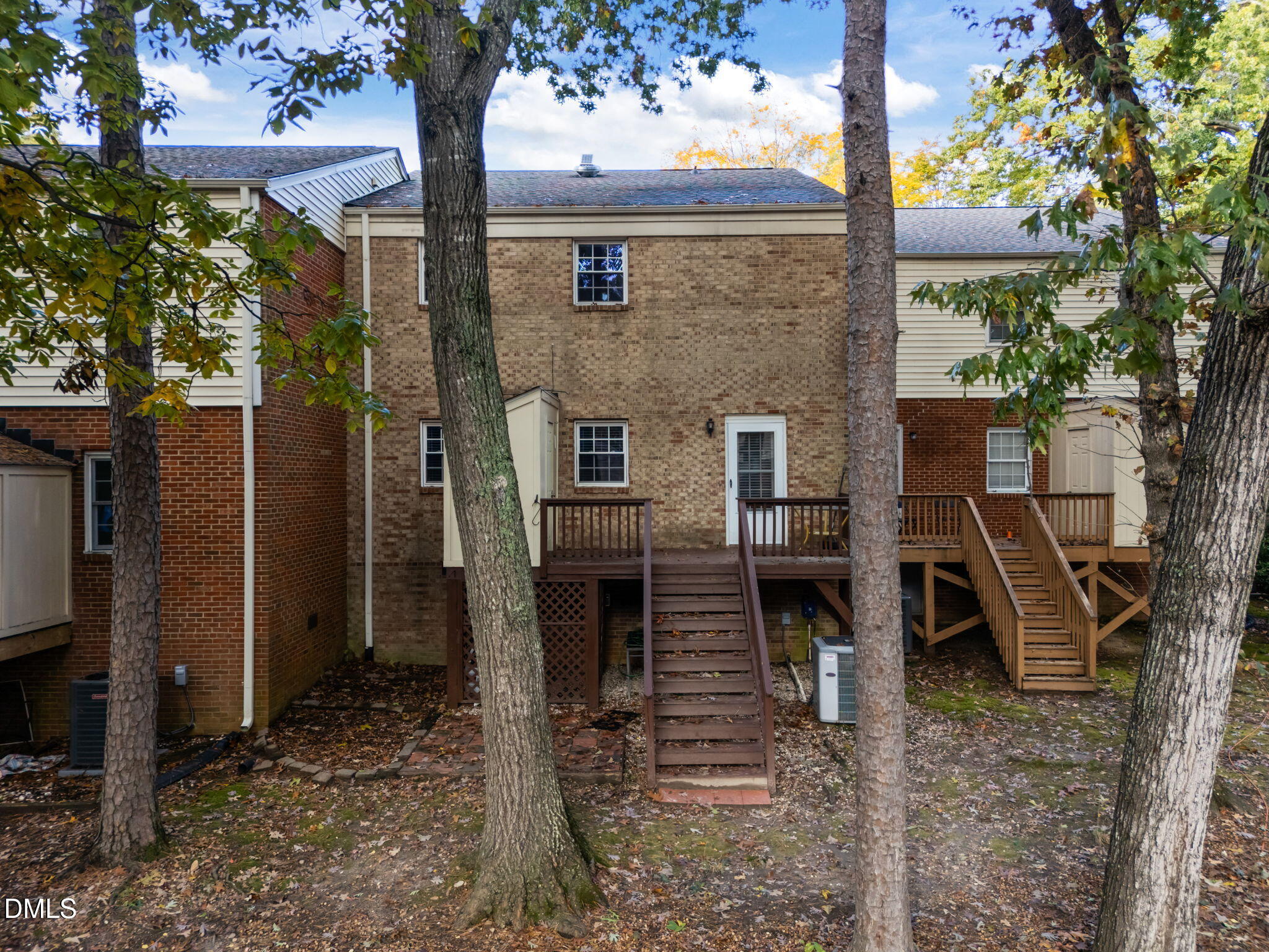 6423 New Market Way Raleigh, NC 27615 - Photo 26 of 33 a front view of a house with garden