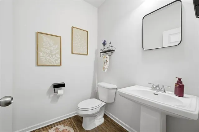 a en suite bathroom with a tub shower and bedroom