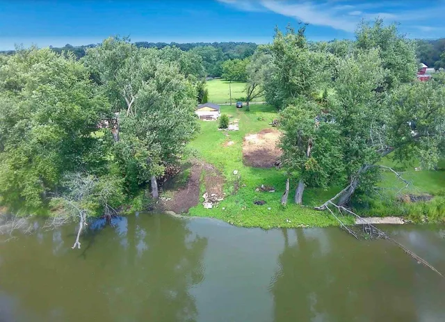 a view of a lake with a building in the background