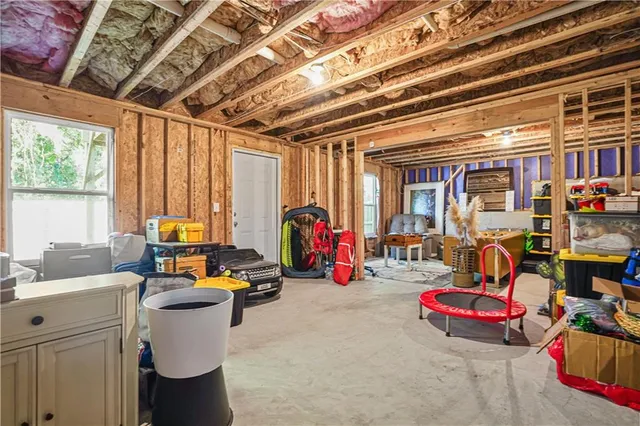 a view of a balcony with furniture