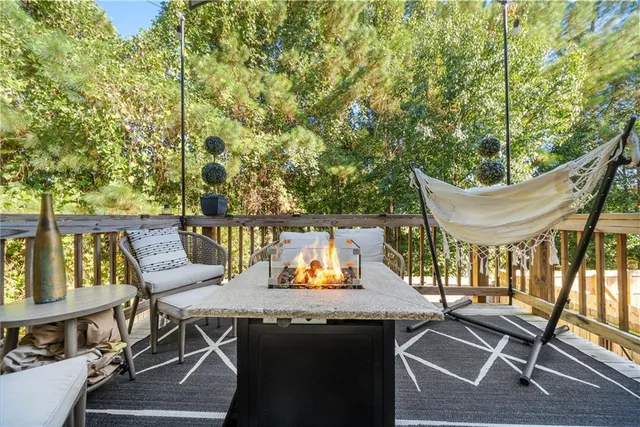 an aerial view of a house with a yard basket ball court and outdoor seating