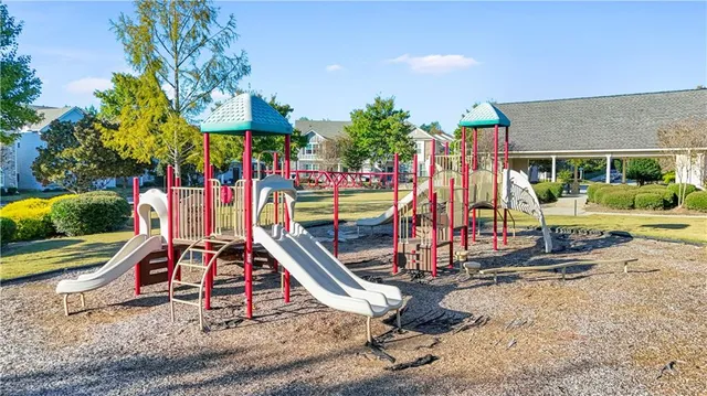 a view of house with outdoor space and sitting area