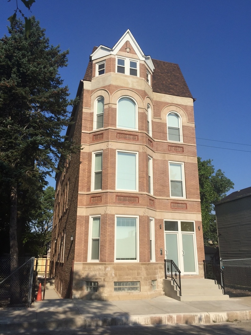 2002 South Desplaines Street, Unit 1F Chicago, IL 60616 - Photo 1 of 9 a view of a big white building