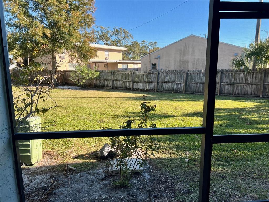 387 South McMullen Booth Road, Unit 13 Clearwater, FL 33759 - Photo 28 of 30 a view of swimming pool from a yard
