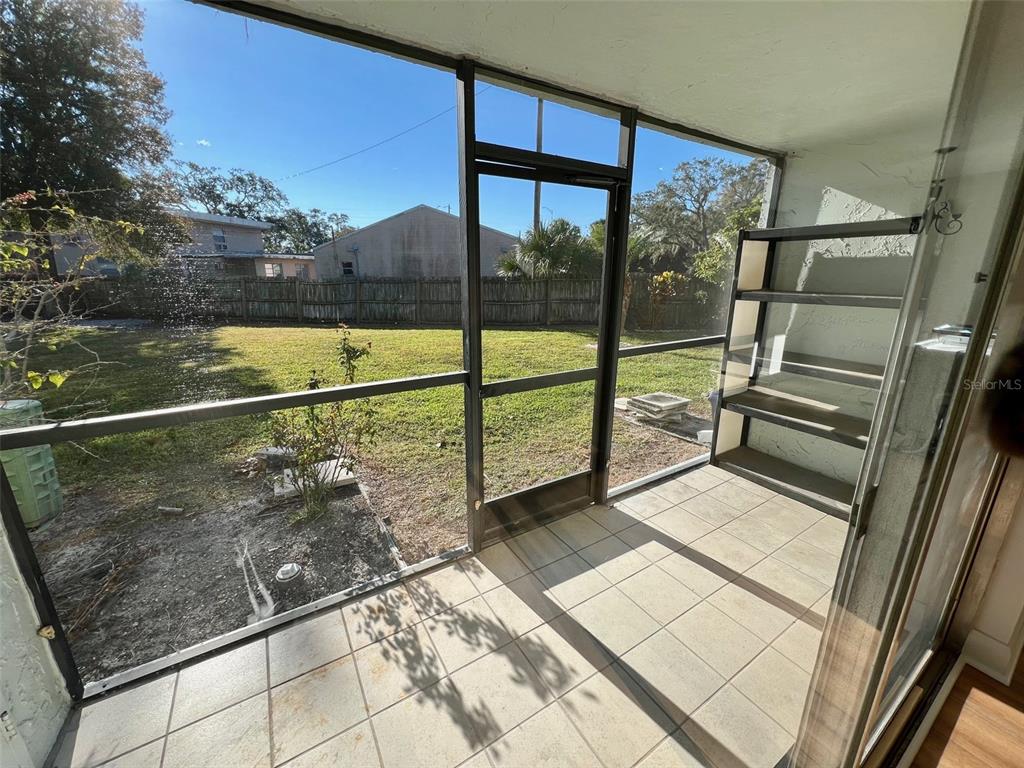 387 South McMullen Booth Road, Unit 13 Clearwater, FL 33759 - Photo 30 of 30 a view of outdoor space with garden