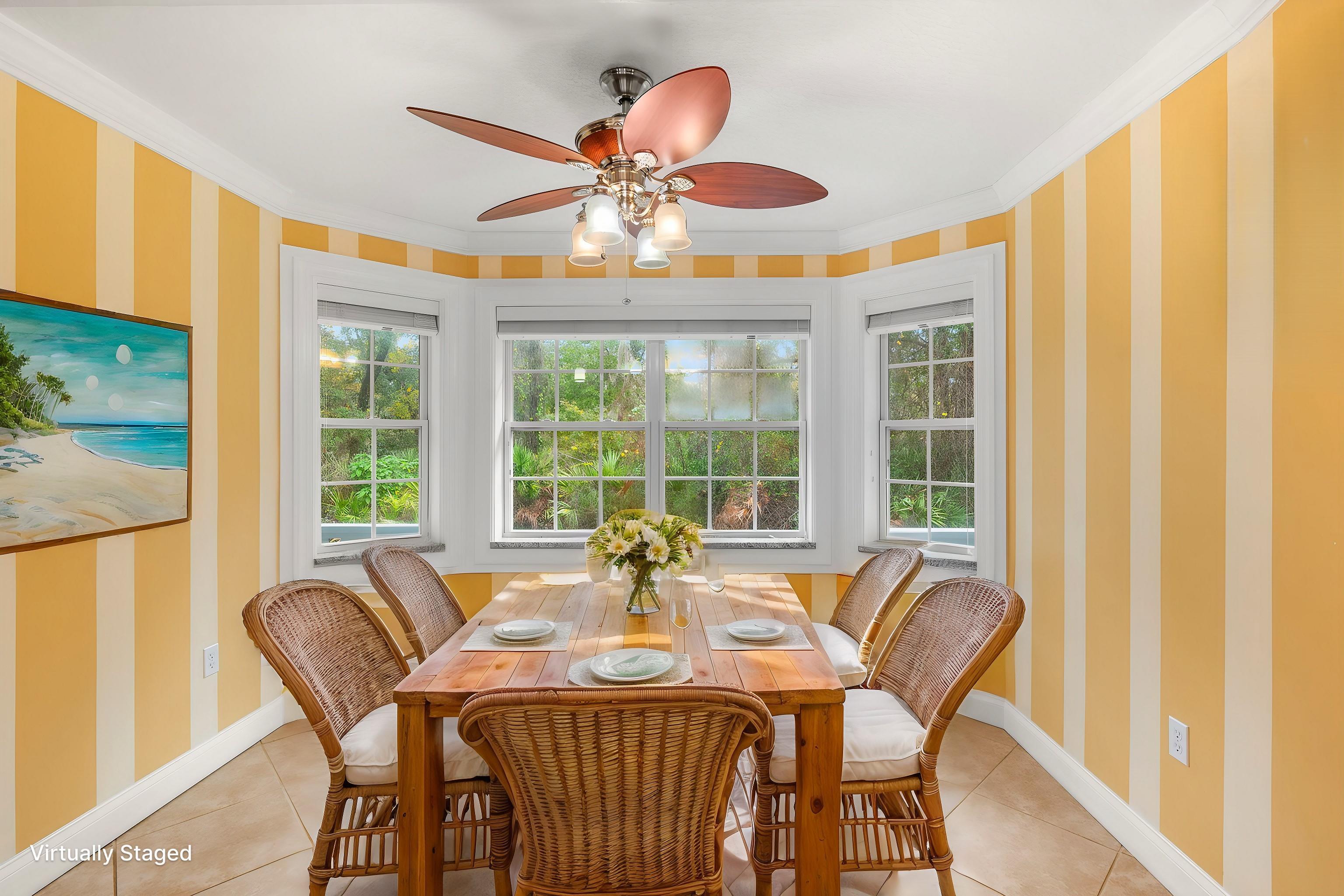 3489 Kings Road St. Augustine, FL 32086 - Photo 17 of 76 a view of a dining room with furniture window and outside view