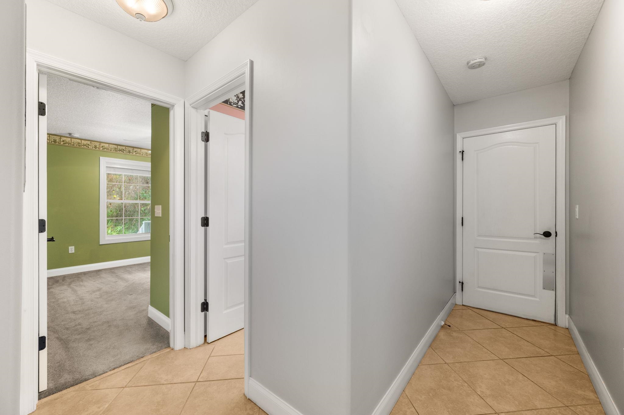 3489 Kings Road St. Augustine, FL 32086 - Photo 30 of 76 a view of a bathroom with a glass door