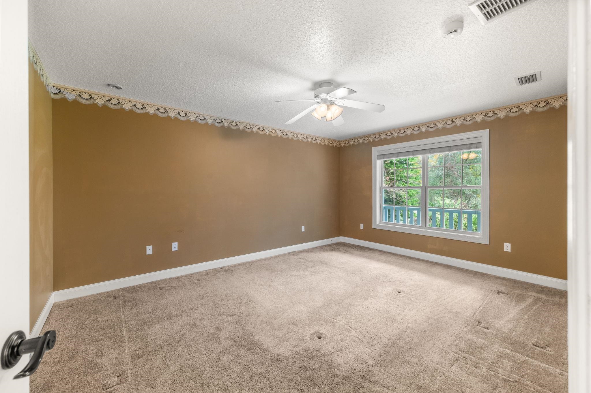 3489 Kings Road St. Augustine, FL 32086 - Photo 35 of 76 a view of an empty room with a window