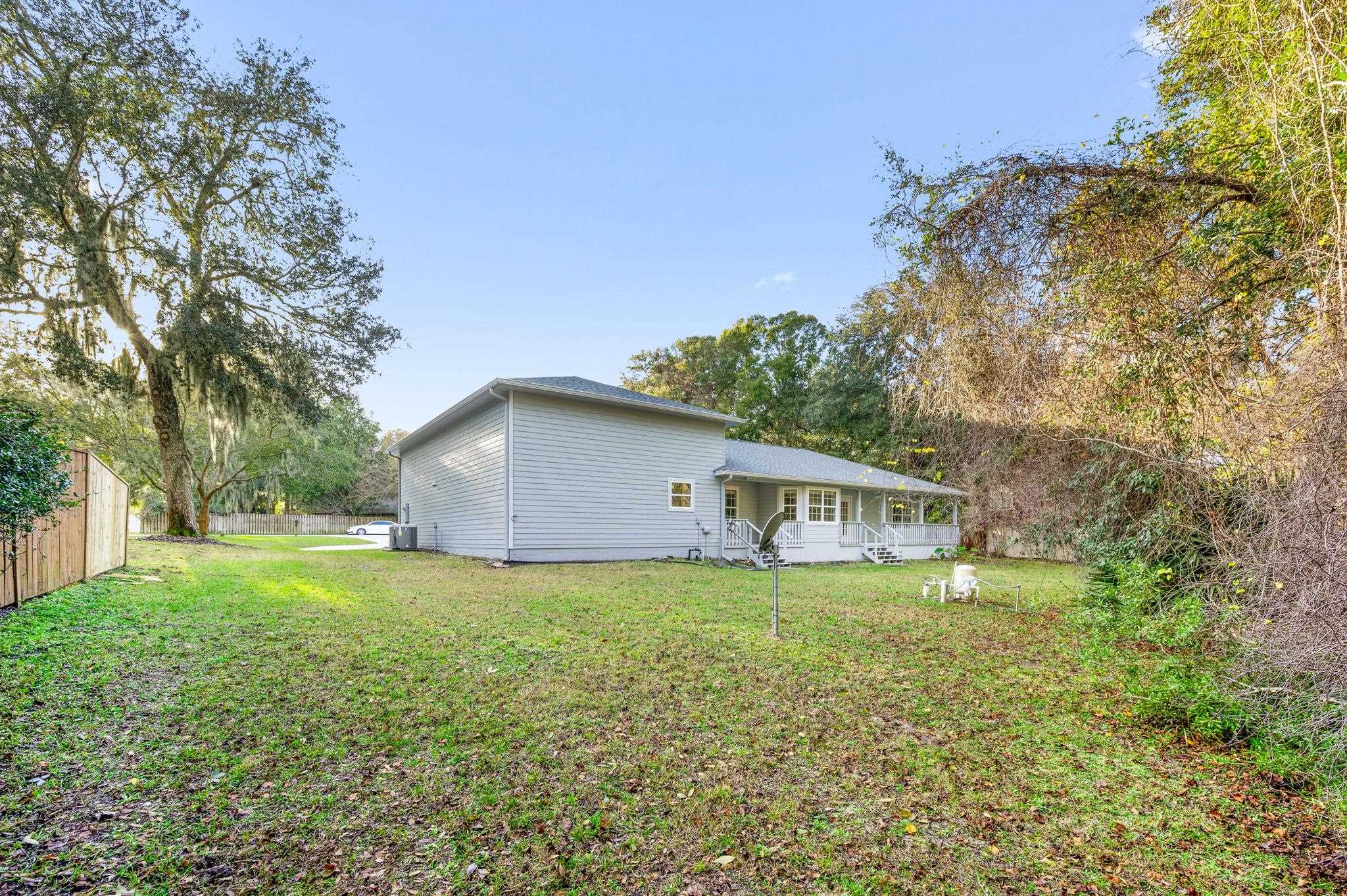 3489 Kings Road St. Augustine, FL 32086 - Photo 61 of 76 a view of a house with a yard