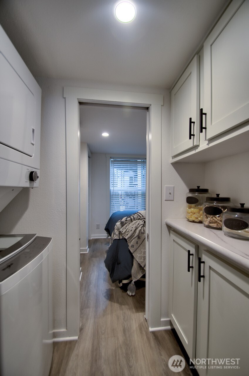 1546 Reservation Road Southeast, Unit 232 Olympia, WA 98513 - Photo 14 of 37 a view of hallway with a car parked on the dresser