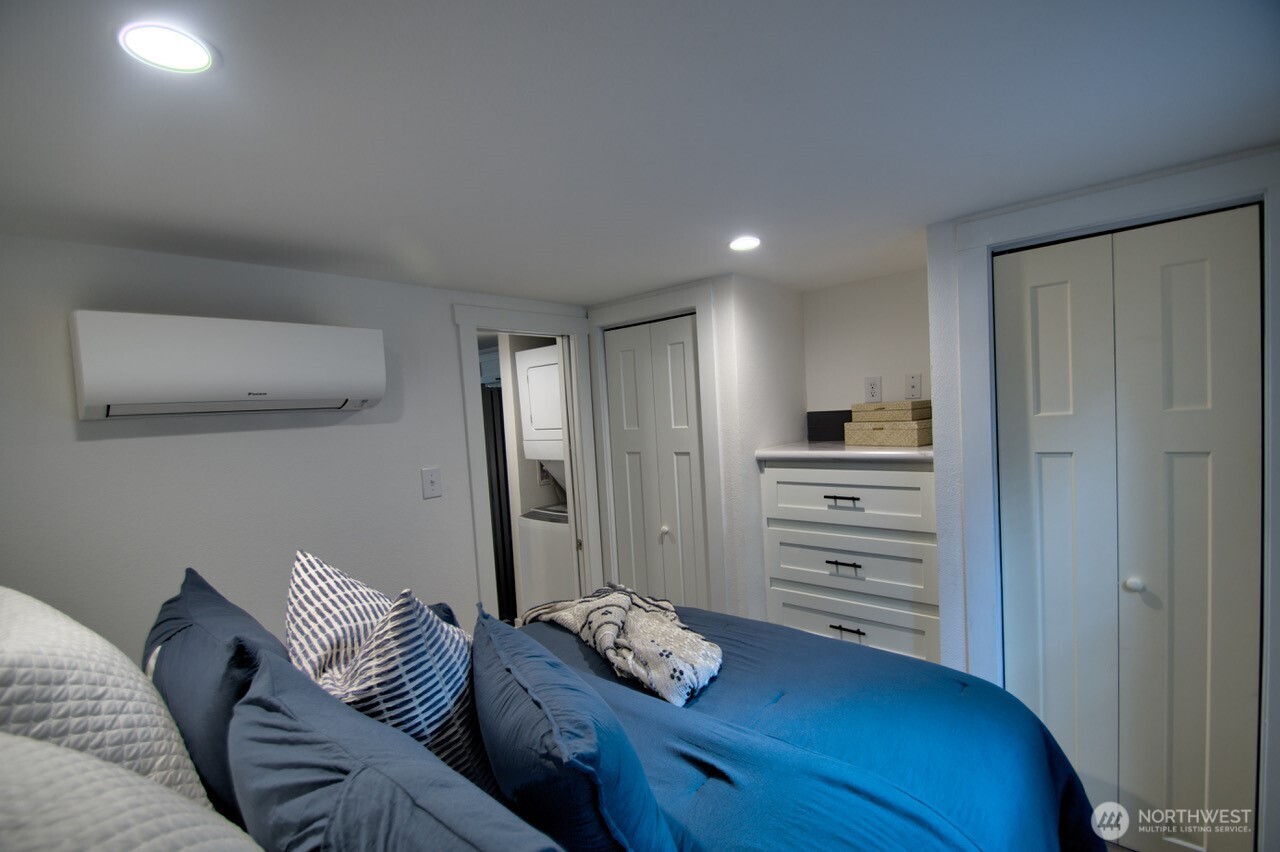 1546 Reservation Road Southeast, Unit 232 Olympia, WA 98513 - Photo 16 of 37 a living room with furniture and a couch
