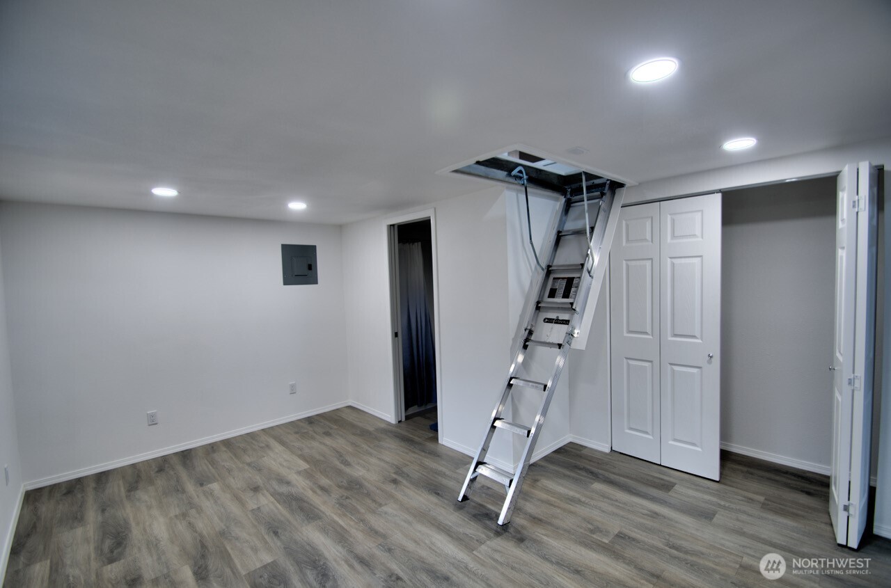 1546 Reservation Road Southeast, Unit 232 Olympia, WA 98513 - Photo 25 of 37 a view of empty room with wooden floor