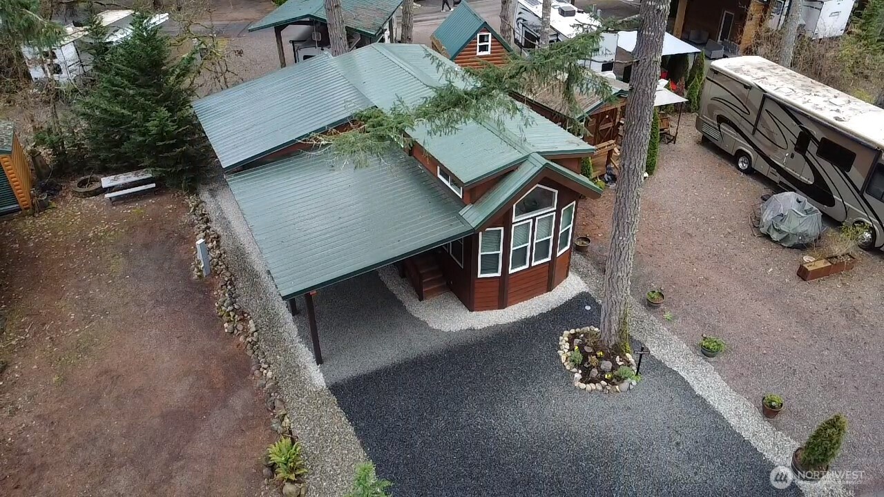 1546 Reservation Road Southeast, Unit 232 Olympia, WA 98513 - Photo 37 of 37 an aerial view of a house with outdoor space