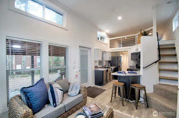 a kitchen with a stove and a microwave