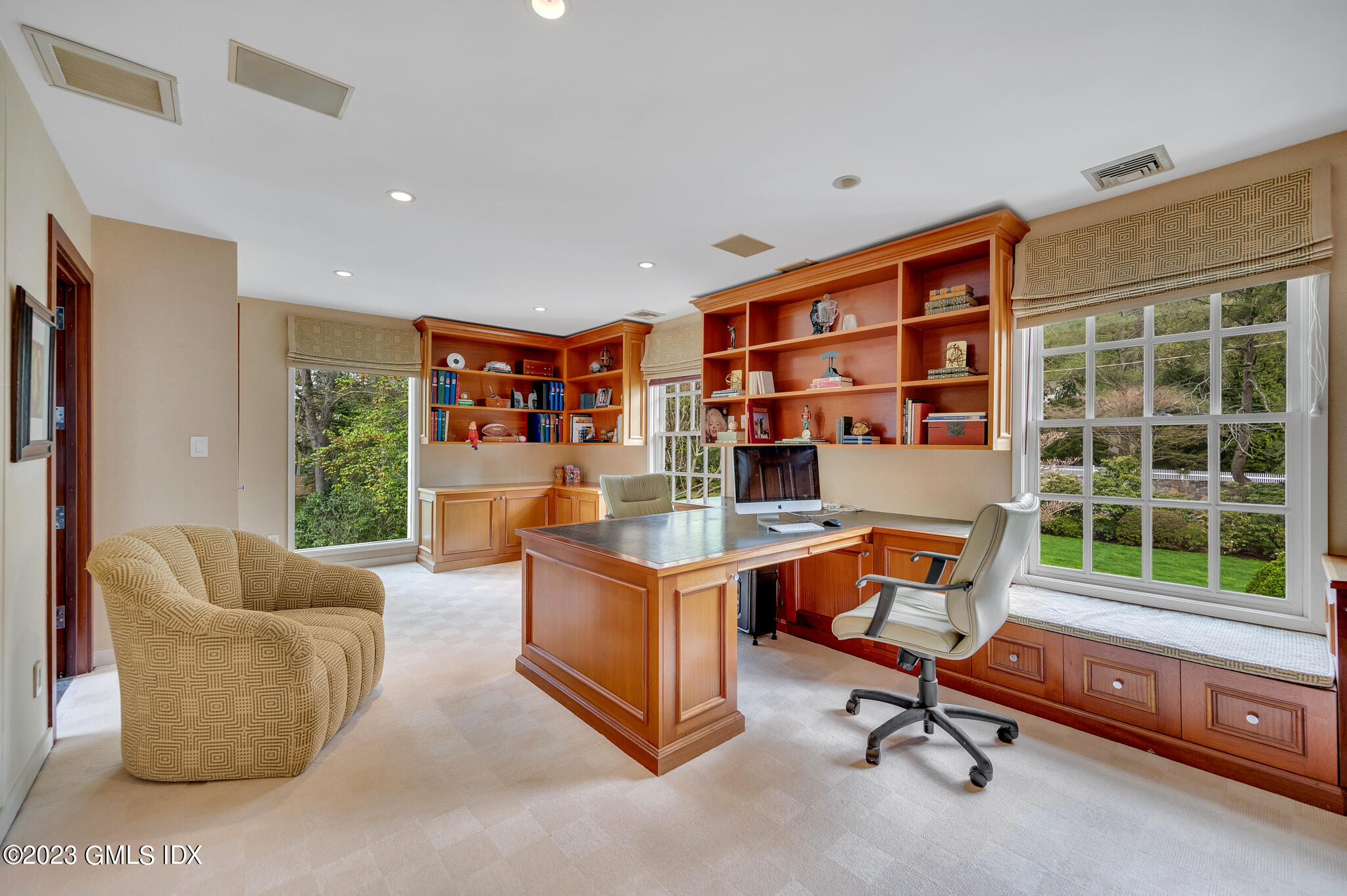 294 Riversville Road Greenwich, CT 06831 - Photo 12 of 17 a view of a livingroom with workspace and a window