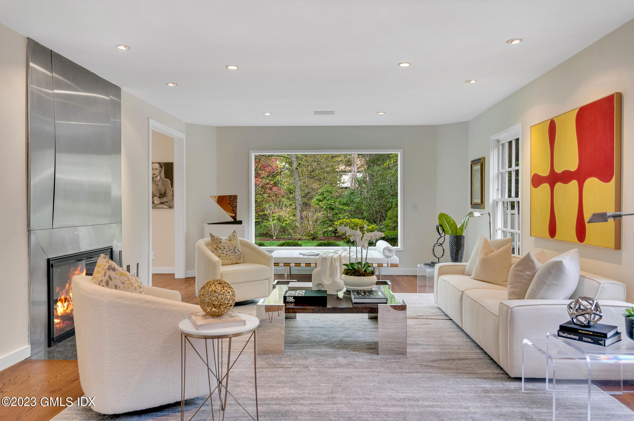 294 Riversville Road Greenwich, CT 06831 - Photo 5 of 17 a living room with furniture and large windows