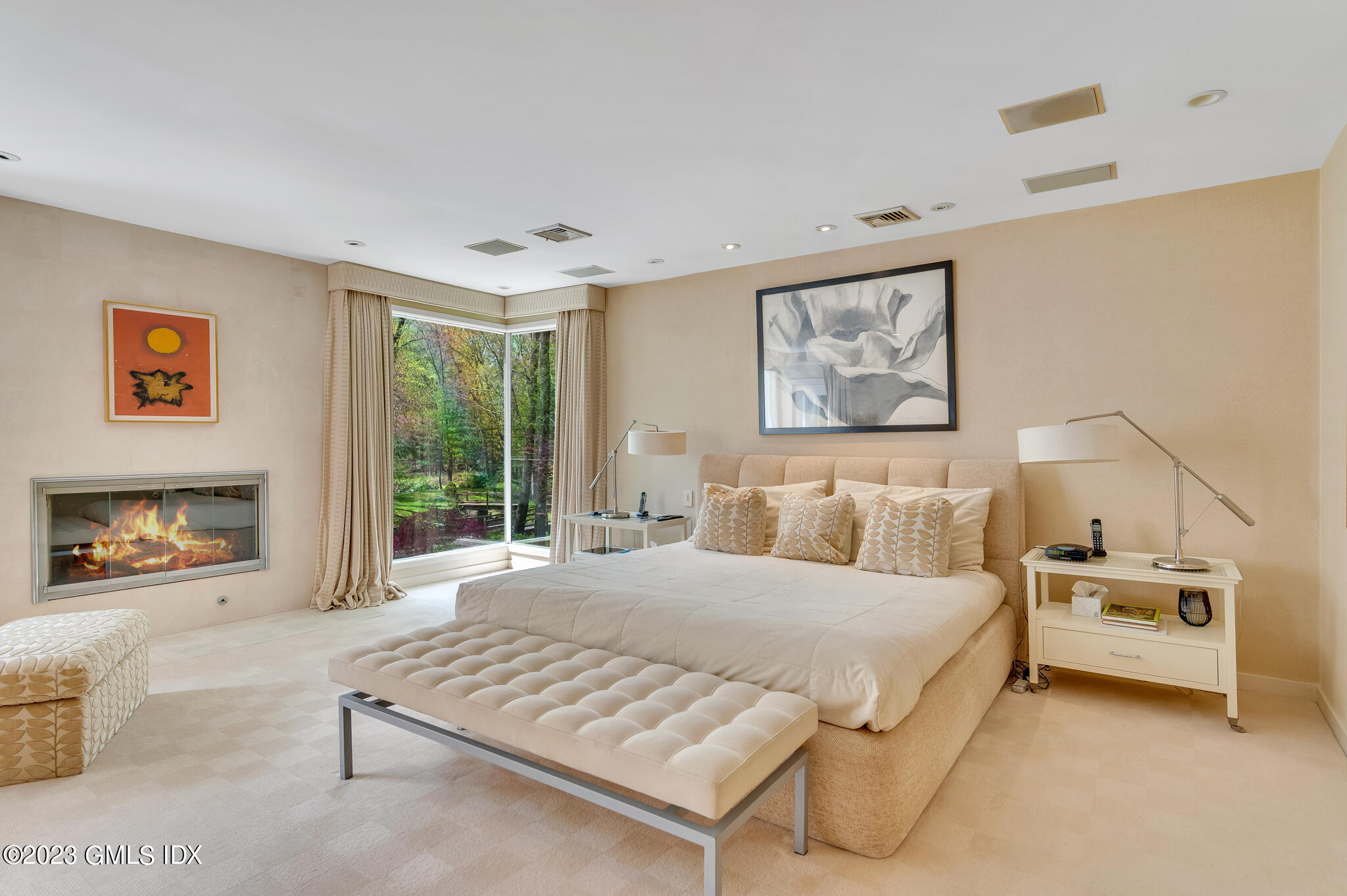 294 Riversville Road Greenwich, CT 06831 - Photo 10 of 17 a bedroom with a bed and a couch