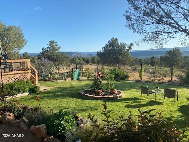 8071 Vista Del Norte Payson, AZ 85541 - Photo 14 of 18 a view of a garden with a lake view