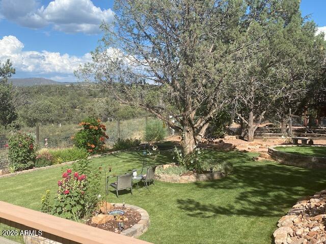 8071 Vista Del Norte Payson, AZ 85541 - Photo 16 of 18 a view of a garden with a tree