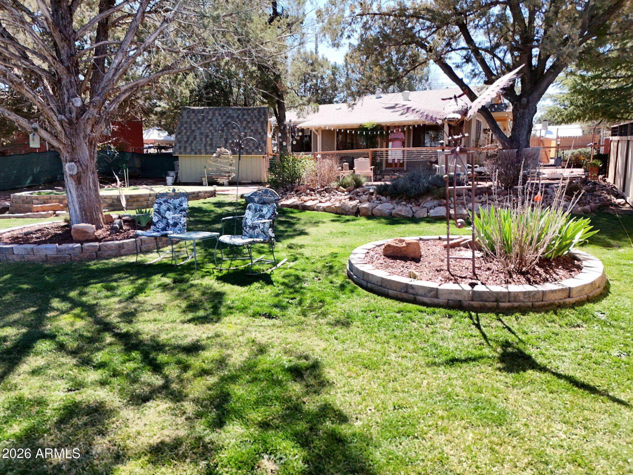 8071 Vista Del Norte Payson, AZ 85541 - Photo 19 of 27 a view of a house with a yard patio and fire pit