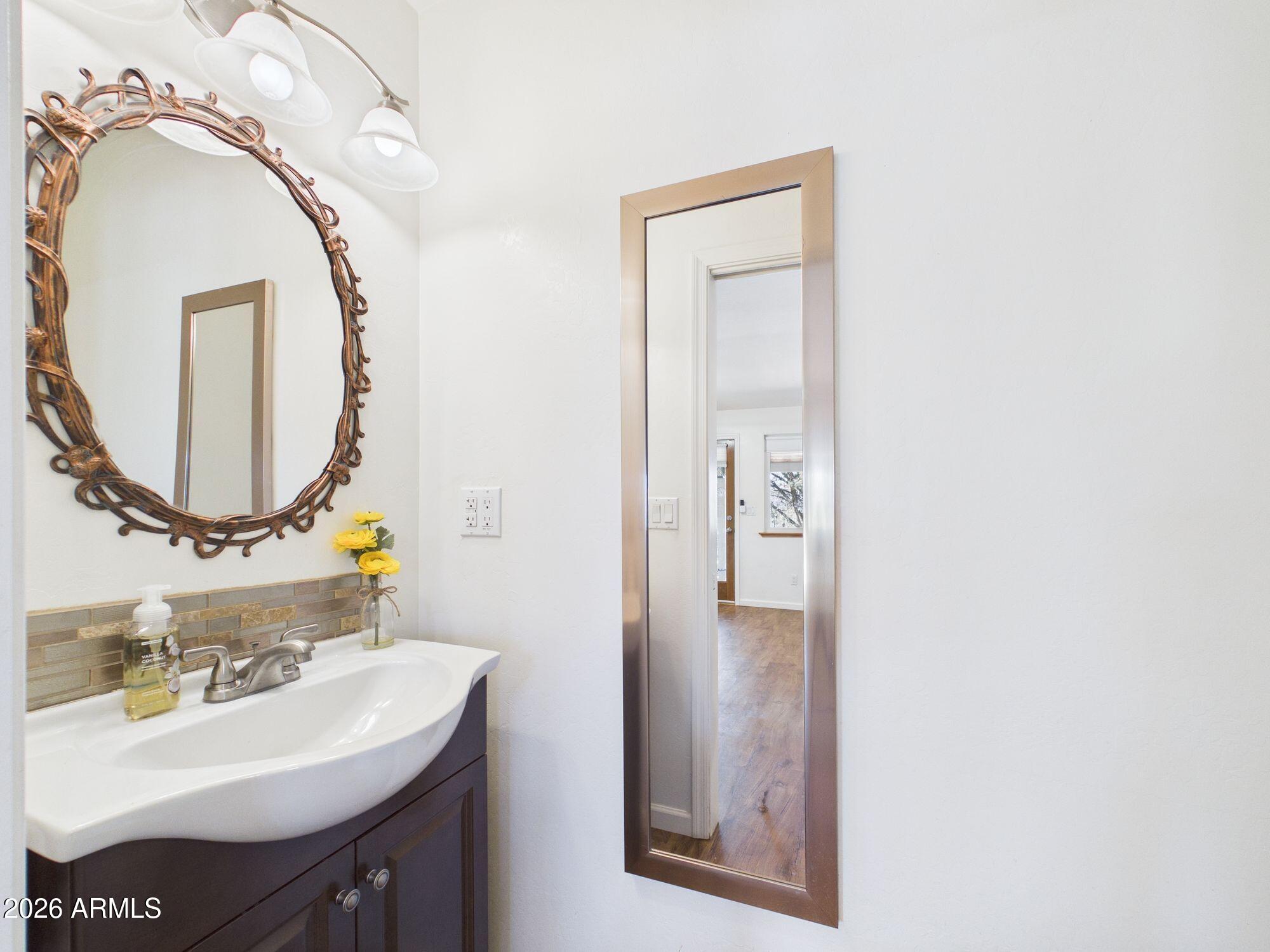 8071 Vista Del Norte Payson, AZ 85541 - Photo 7 of 27 a bathroom with a sink and a mirror