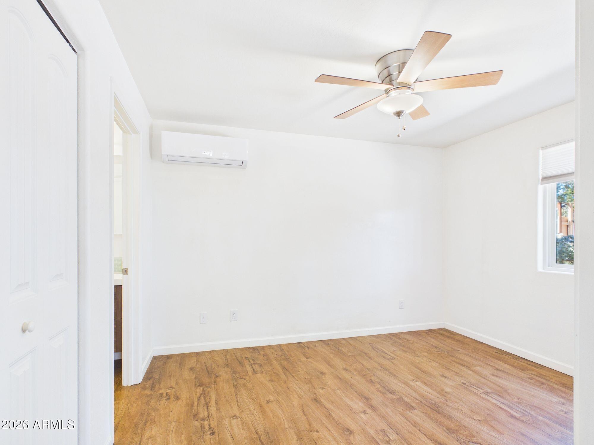 8071 Vista Del Norte Payson, AZ 85541 - Photo 8 of 27 a view of a room with wooden floor and a ceiling fan