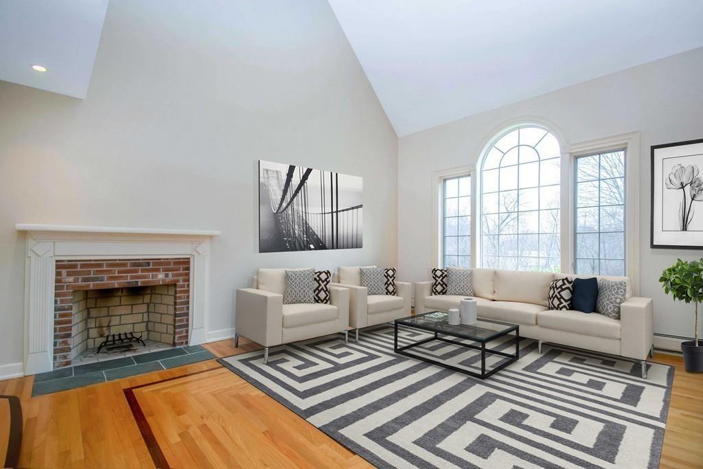 115 Chilson Road Wilbraham, MA 01095 - Photo 15 of 35 a living room with furniture and a fireplace