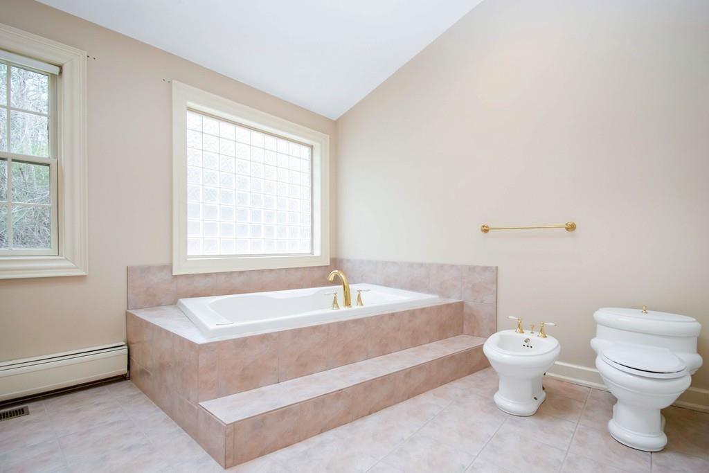 115 Chilson Road Wilbraham, MA 01095 - Photo 18 of 35 a spacious bathroom with a bathtub and toilet
