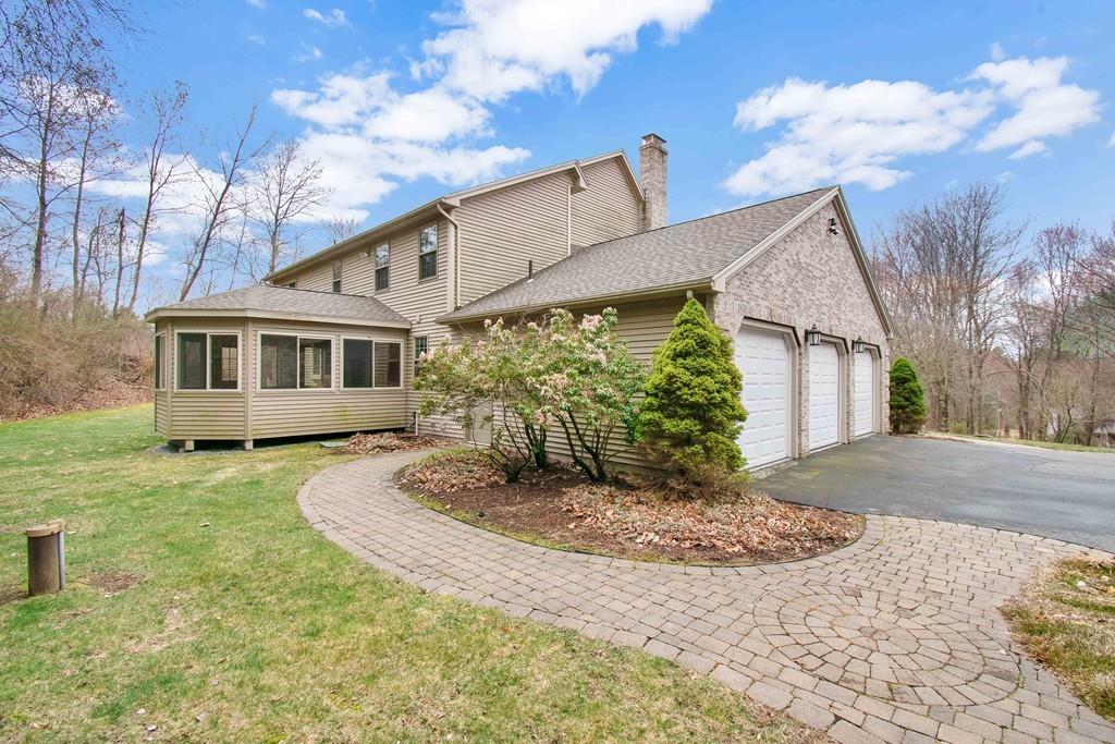 115 Chilson Road Wilbraham, MA 01095 - Photo 2 of 35 a front view of a house with garden