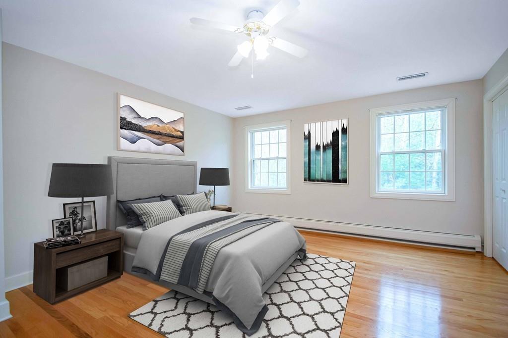 115 Chilson Road Wilbraham, MA 01095 - Photo 26 of 35 a bedroom with a bed and a chandelier