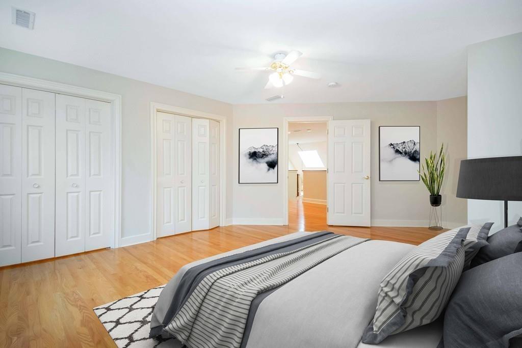 115 Chilson Road Wilbraham, MA 01095 - Photo 27 of 35 a bedroom with a bed and a chandelier
