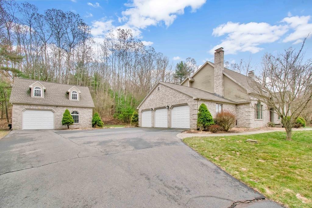 115 Chilson Road Wilbraham, MA 01095 - Photo 30 of 35 front view of house with a yard and potted plants
