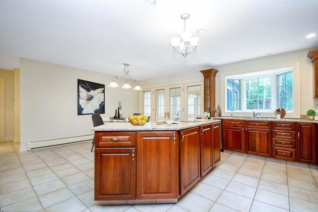 115 Chilson Road Wilbraham, MA 01095 - Photo 6 of 35 a large kitchen with stainless steel appliances granite countertop a stove and a sink