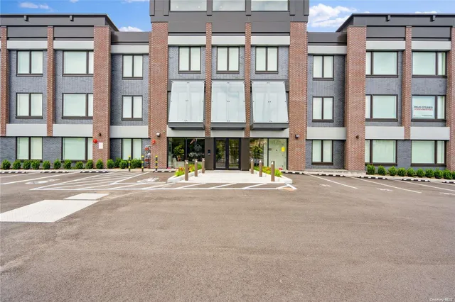 a view of a building on a street